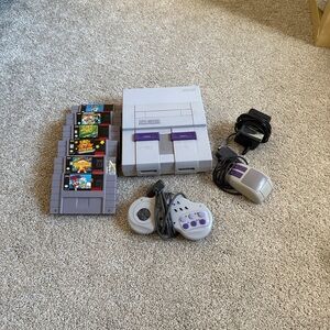 Super Nintendo with 6 games and a controller bundle with mouse